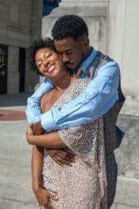 An image of a happy male and female illustrates the happiness that comes from a man being able to maintain an erection.