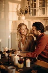 An image of a man and woman illustrates that knowing that your partner can maintain an erection brings a smile to your face.