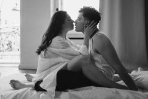 An intimate photo of a man and woman illustrates that when you make your penis grow, you can approach making love with confidence.